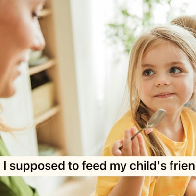 A woman and two young children eat breakfast at a dining table. The girl in a yellow shirt looks curiously at the woman, holding a spoon.