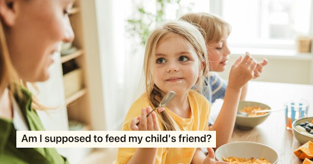 A woman and two young children eat breakfast at a dining table. The girl in a yellow shirt looks cur...