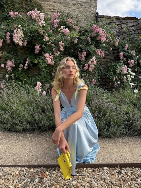 Elsa Hosk wears a light blue lacy nightgown.