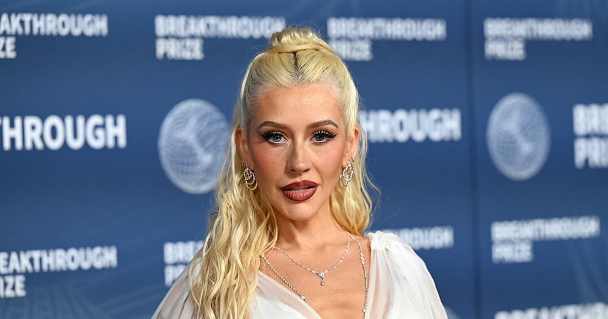 Christina Aguilera Gave Her 2003 Versace Corset Dress A Refresh With A Goth Lip