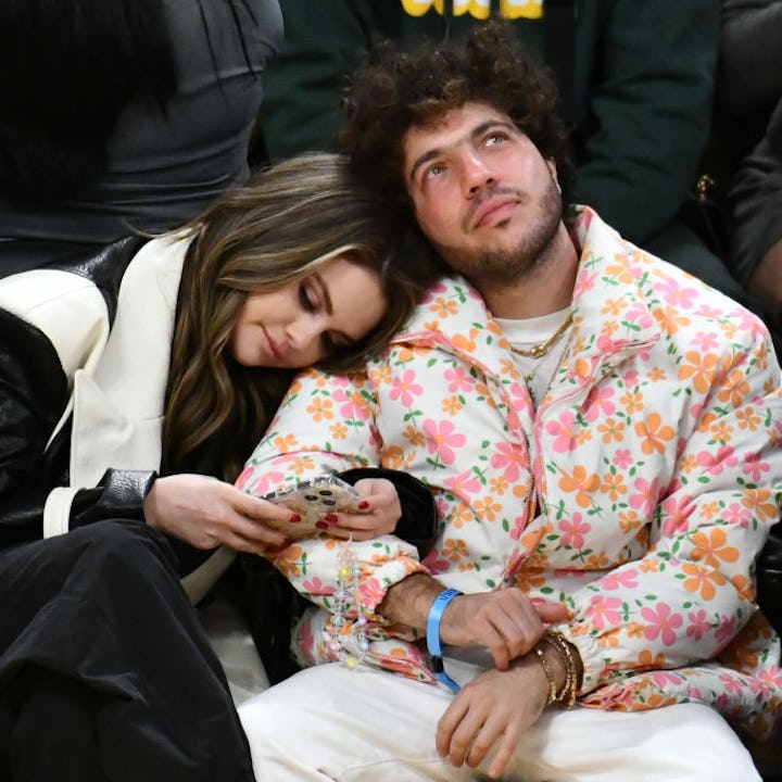 LOS ANGELES, CALIFORNIA - JANUARY 03: Selena Gomez and Benny Blanco attend a basketball game between...