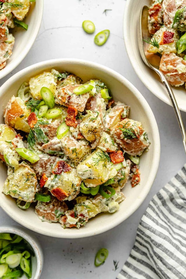 potato salad in a bowl, in a story about easy recipes to use up potatoes
