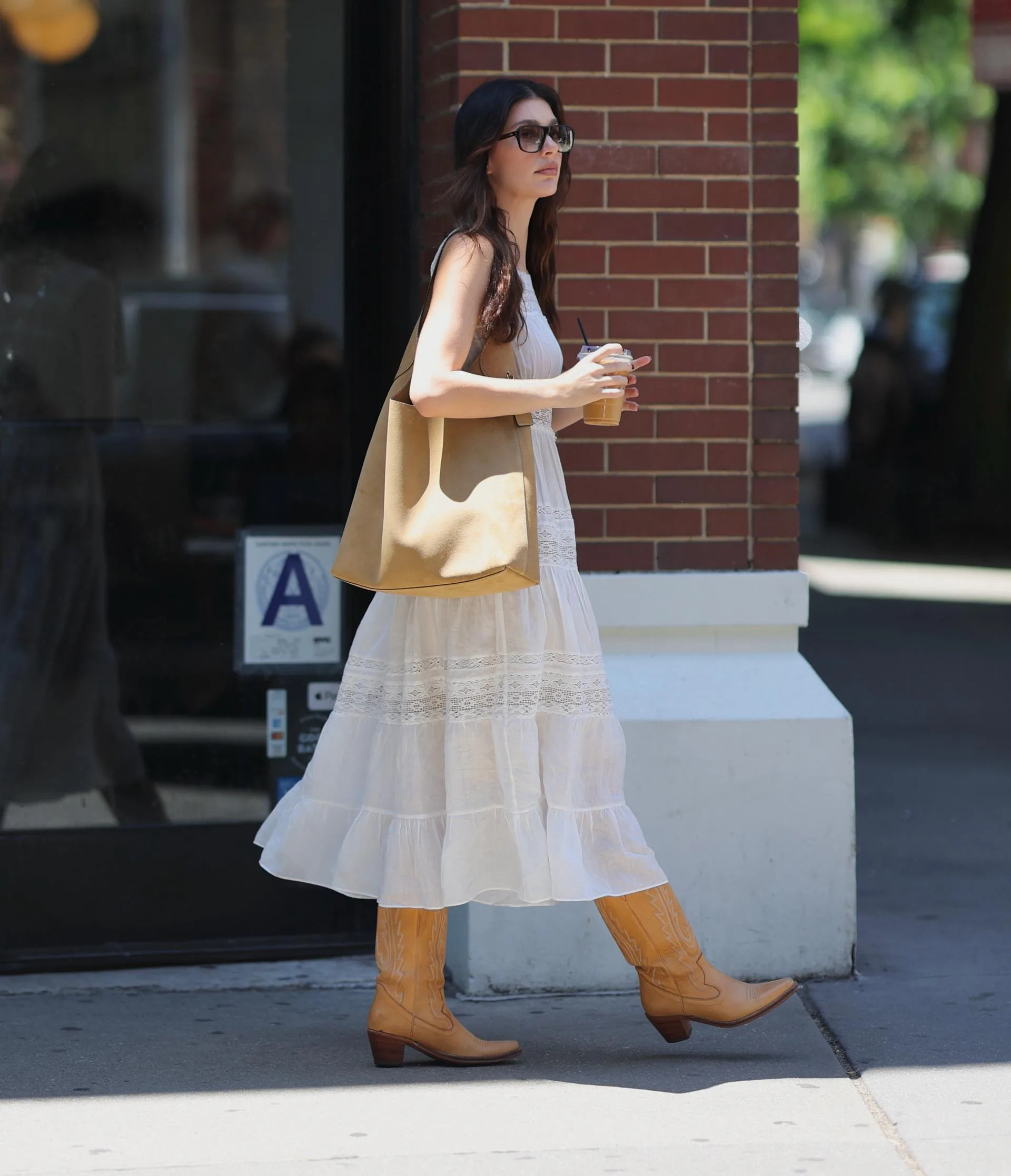 bella hadid white lace dress Bella Hadid Channels Jane Birkin in Plunging Lace Dress in Cannes