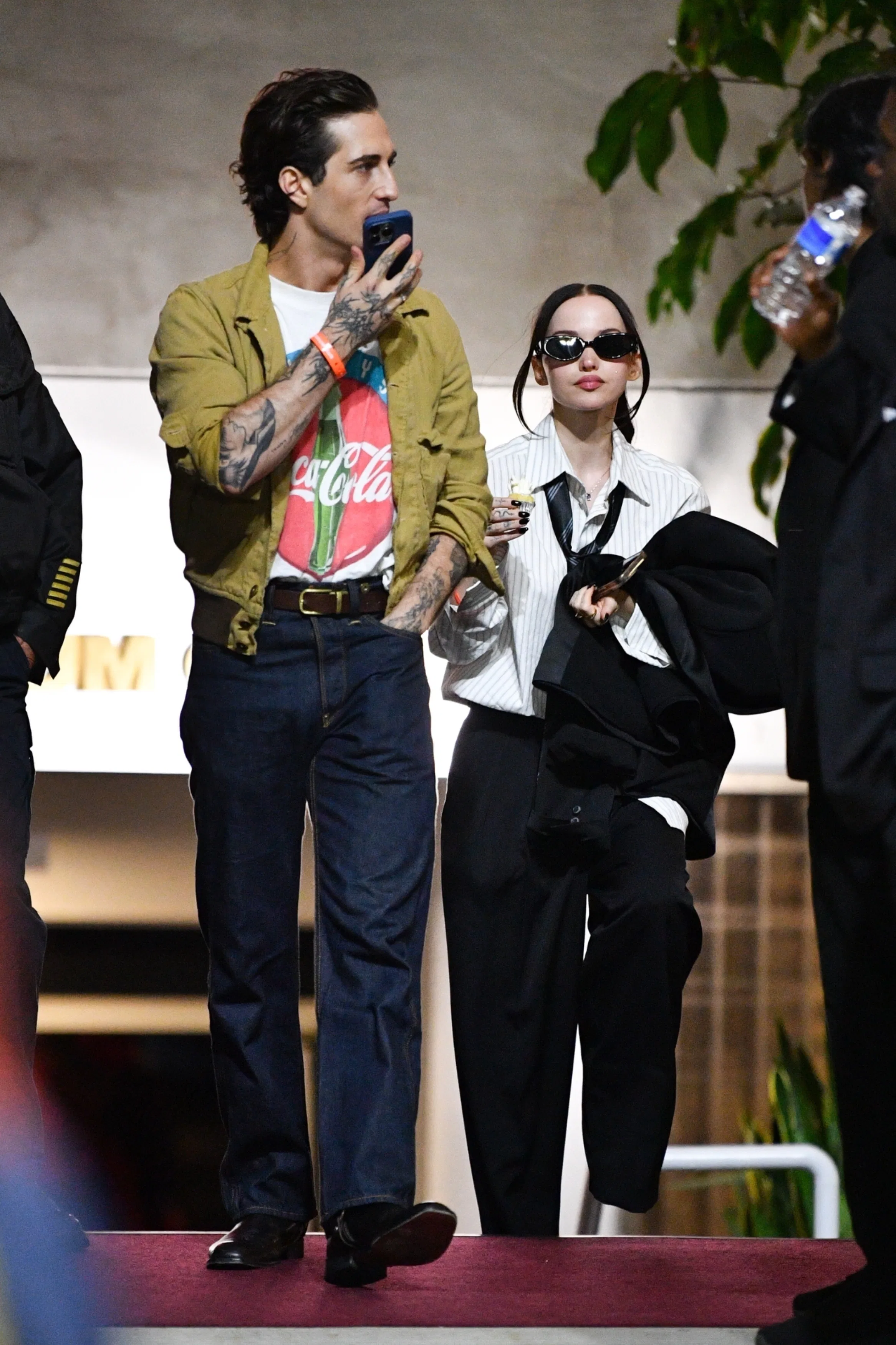 Dove Cameron & Damiano David Do Twists on Menswear at the 'Mayhem' Tour