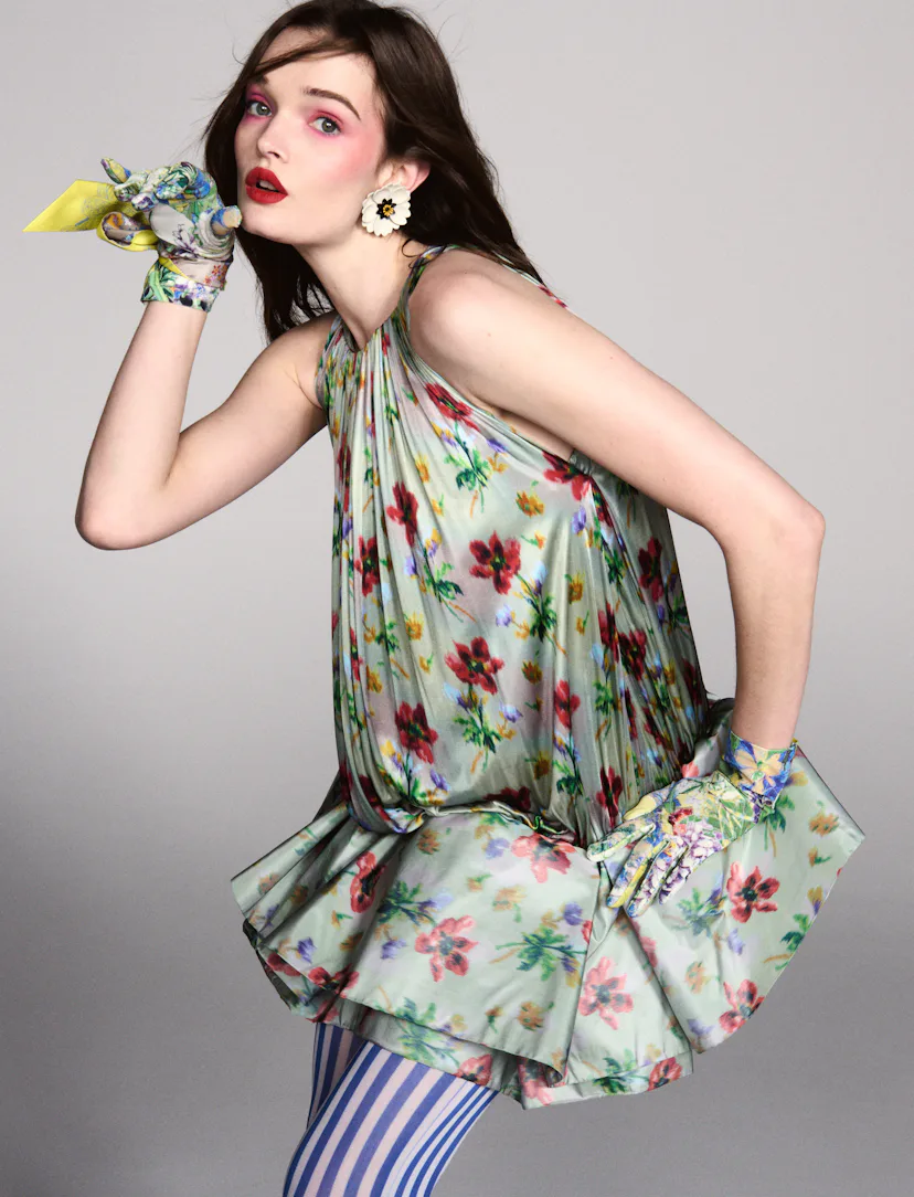 a model with red lipstick and pink cheeks