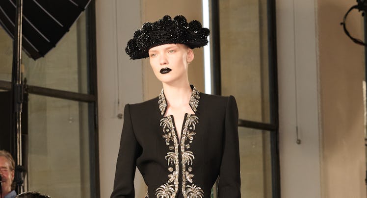 A model walks Schiaparelli couture runway Fall 2025