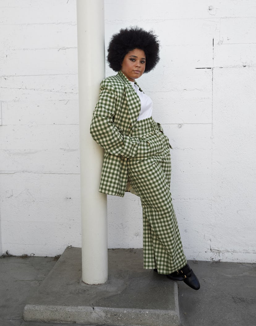 Tayla Parx wears Tanner Fletcher jacket and pants; Loro Piana T-shirt; Gucci shoes.