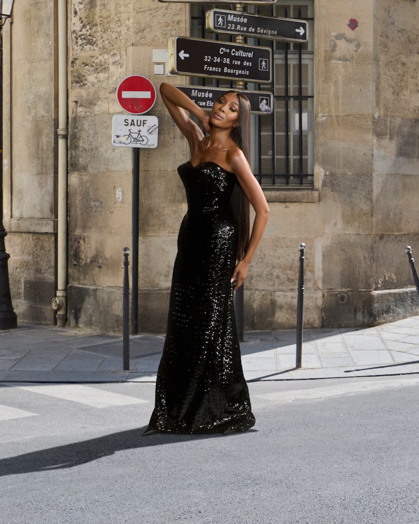 Naomi Campbell wearing a black Balenciaga gown