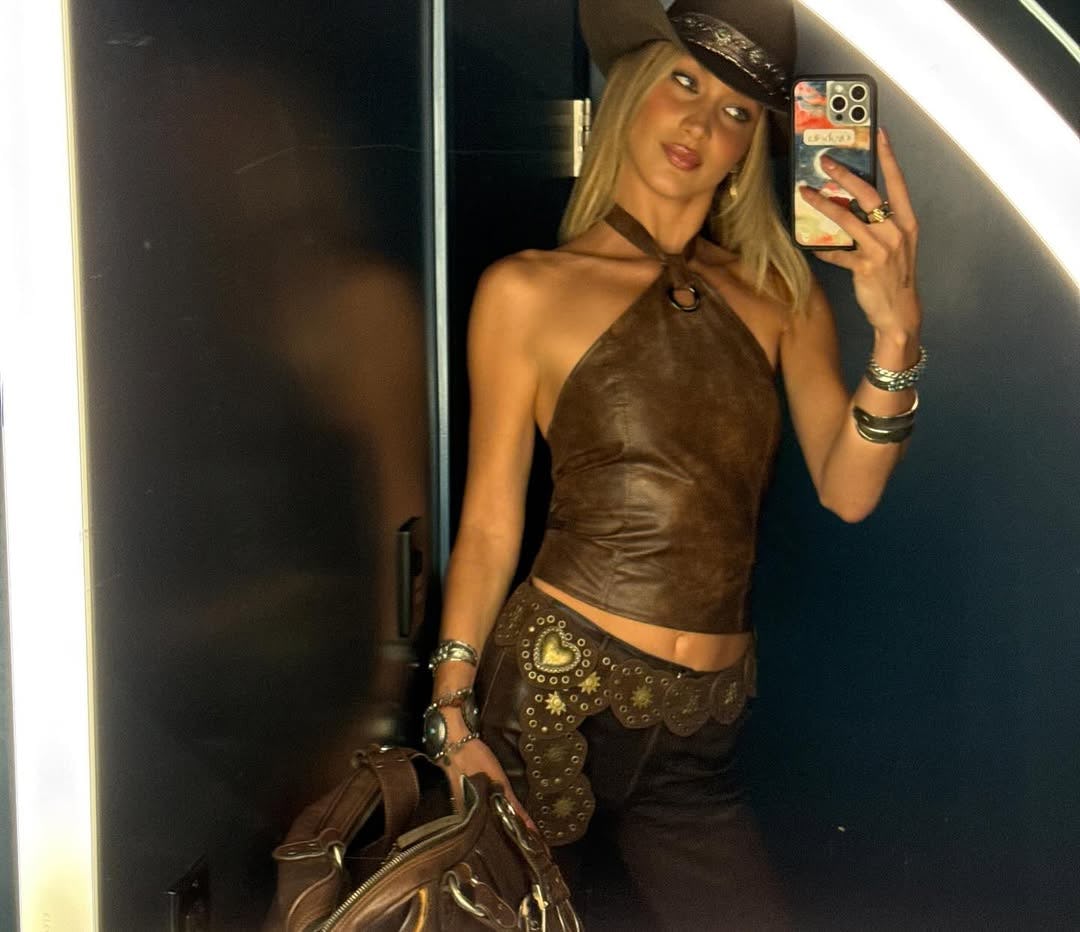 Bella Hadid wore a cowboycore outfit at a Backstreet Boys concert.