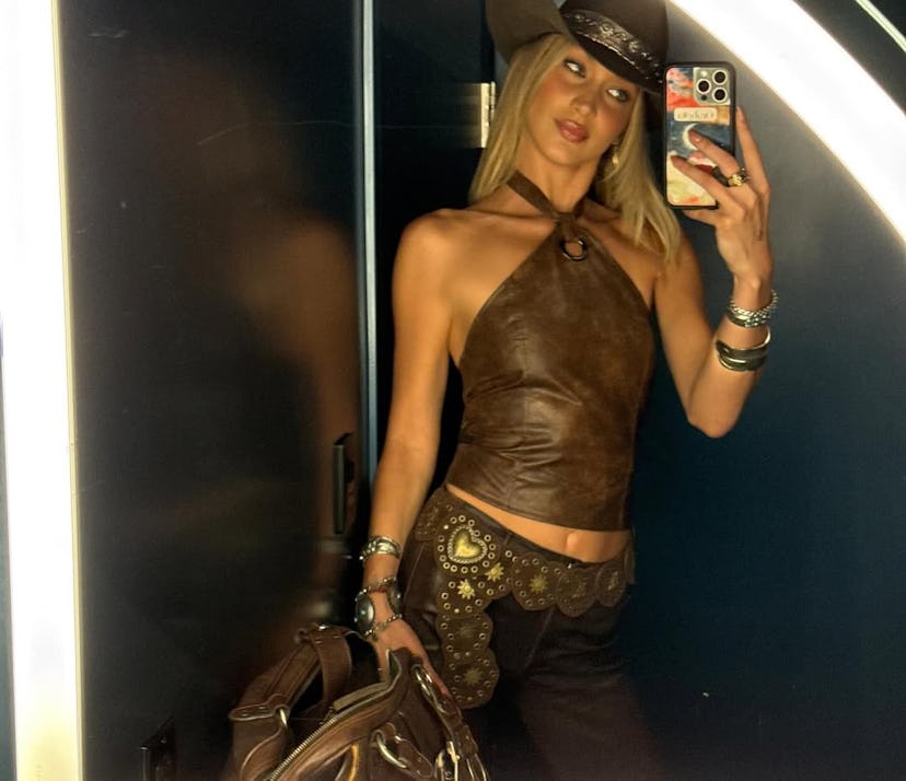 Bella Hadid wore a cowboycore outfit at a Backstreet Boys concert.