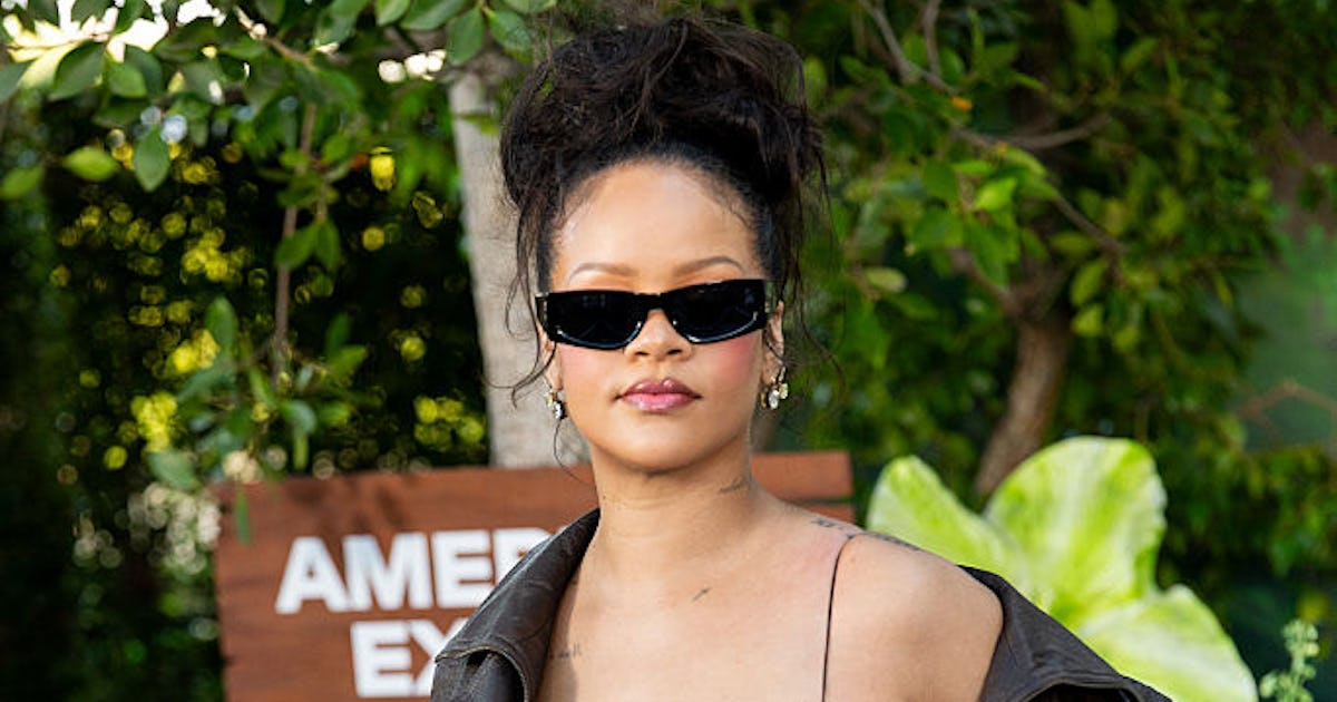 Only Rihanna Could Make A Side Part & Mini "Bump It" Look So Cool