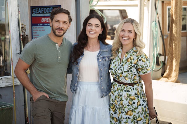 Michael Rady, Katie Lee, and Emilie Ullerup on the set of Hallmark's new movie 'Catch of the Day.'