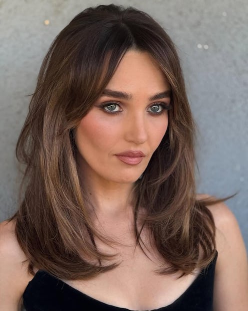 Chloe Fineman with smoked suede brunette hair color