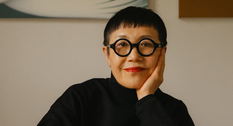 Yamaguchi sitting in her studio space