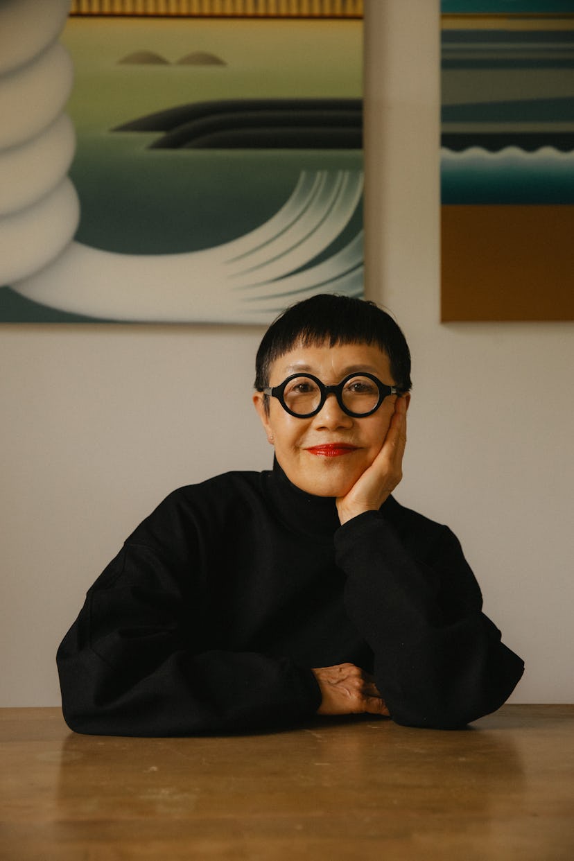 Yamaguchi sitting in her studio space