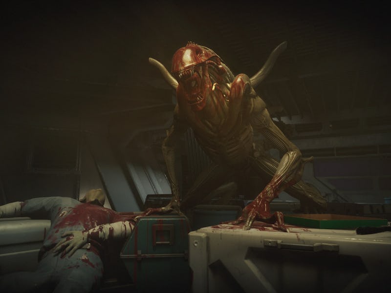 A bloody Xenomorph next to a dead scientist