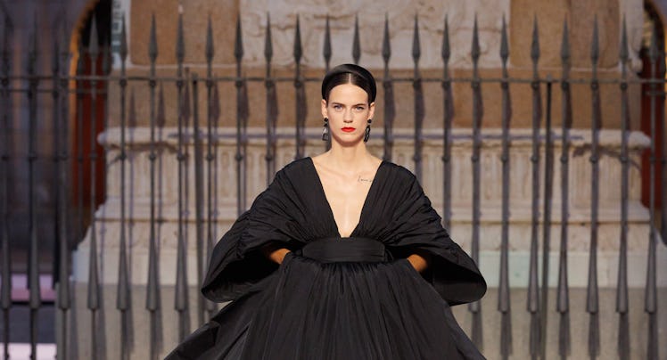 Model walks the Carolina Herrera runway in Madrid's Plaza Mayor