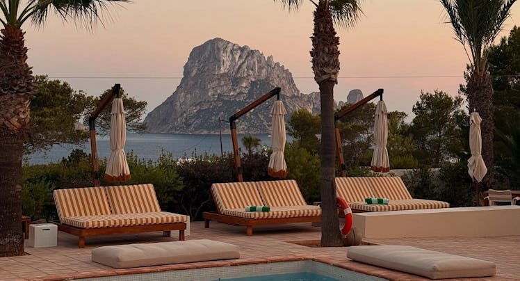 A view from the pool at @petuniaibiza