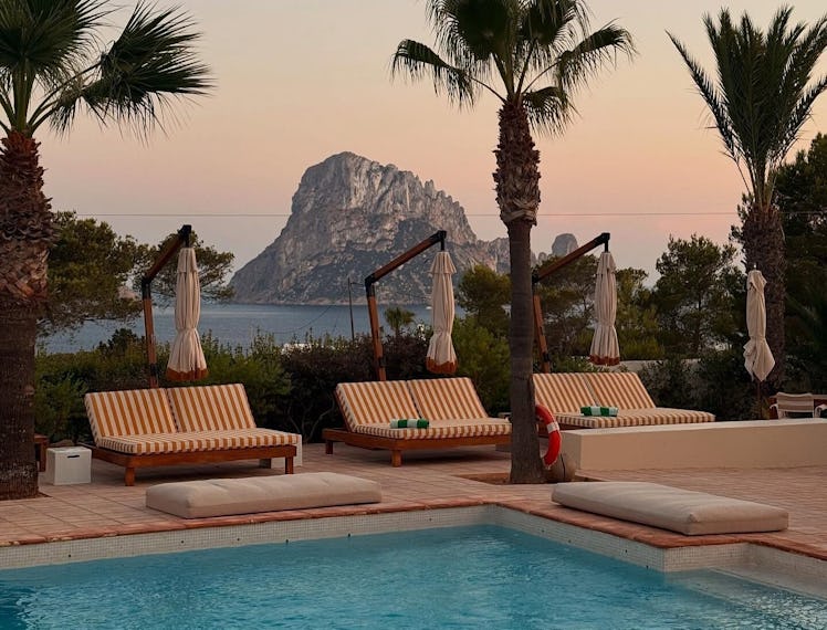 A view from the pool at @petuniaibiza