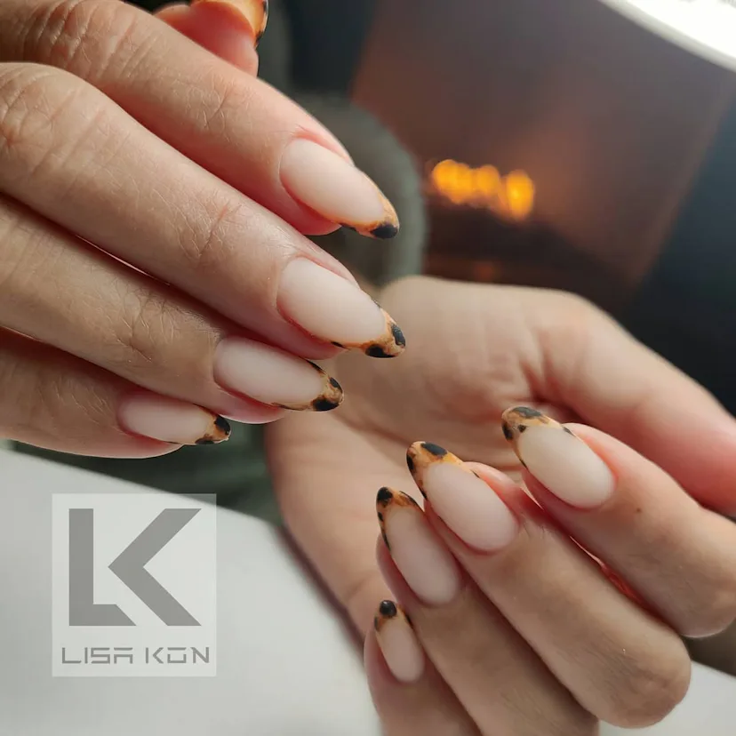 These Celeb Manis Make The Case For Going Full Animal Print 9 Kourtney Kardashian leopard print French manicure
