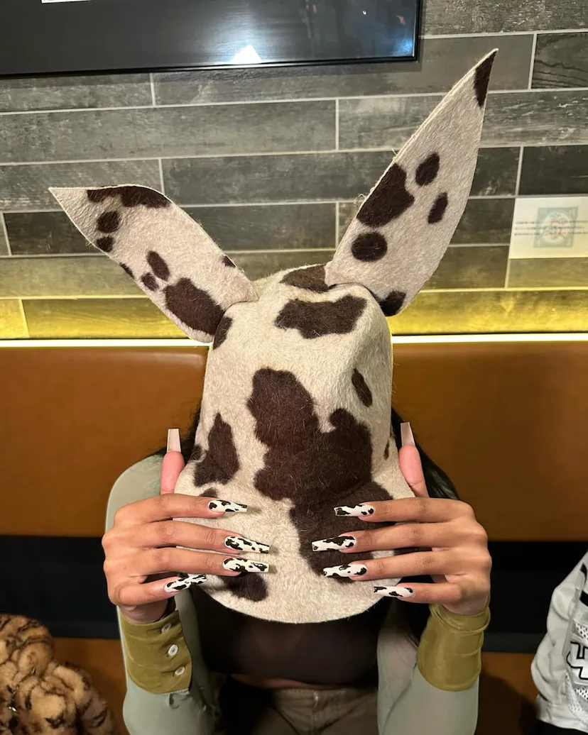 These Celeb Manis Make The Case For Going Full Animal Print 7 Meg Thee Stallion with cow print nails