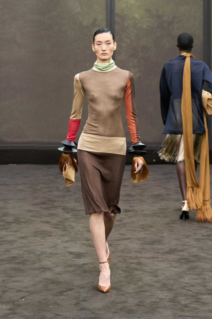 a look from ferragamo spring 2026 collection shown at milan fashion week worn by model liu wen