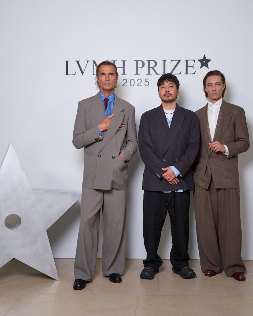 Otsuki with his designs.