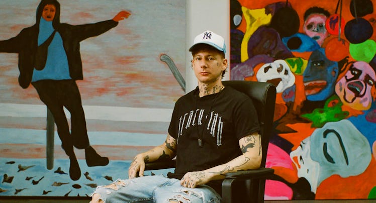 Florian Krewer sitting in his studio
