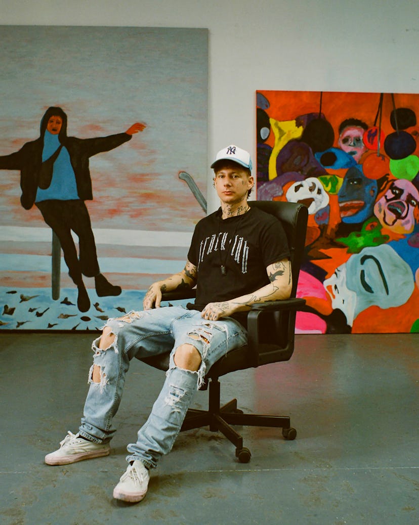 Florian Krewer sitting in his studio