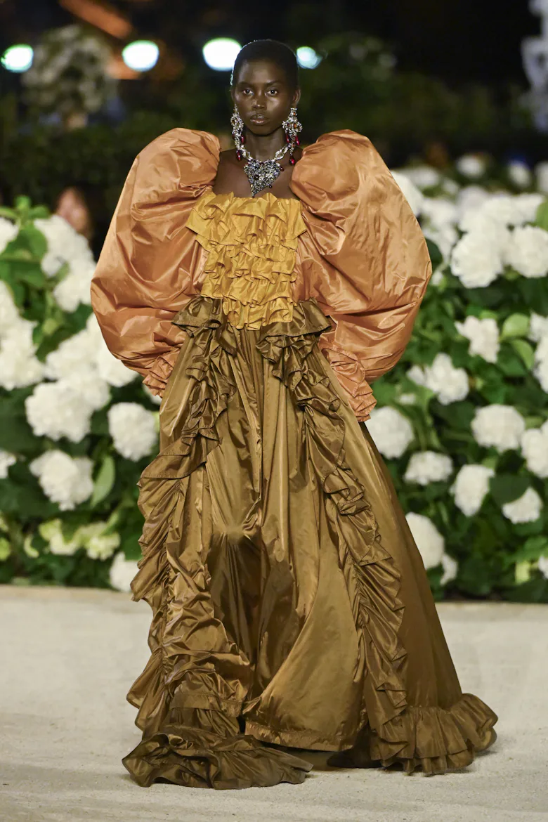 A model walks the runway during the Saint Laurent Ready to Wear Spring/Summer 2026 fashion show as p...