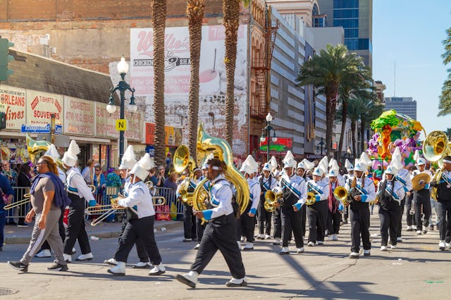 A group of musicians during the parade along Canal street on Mardi Gras Day. Mardi Gras' celebration...