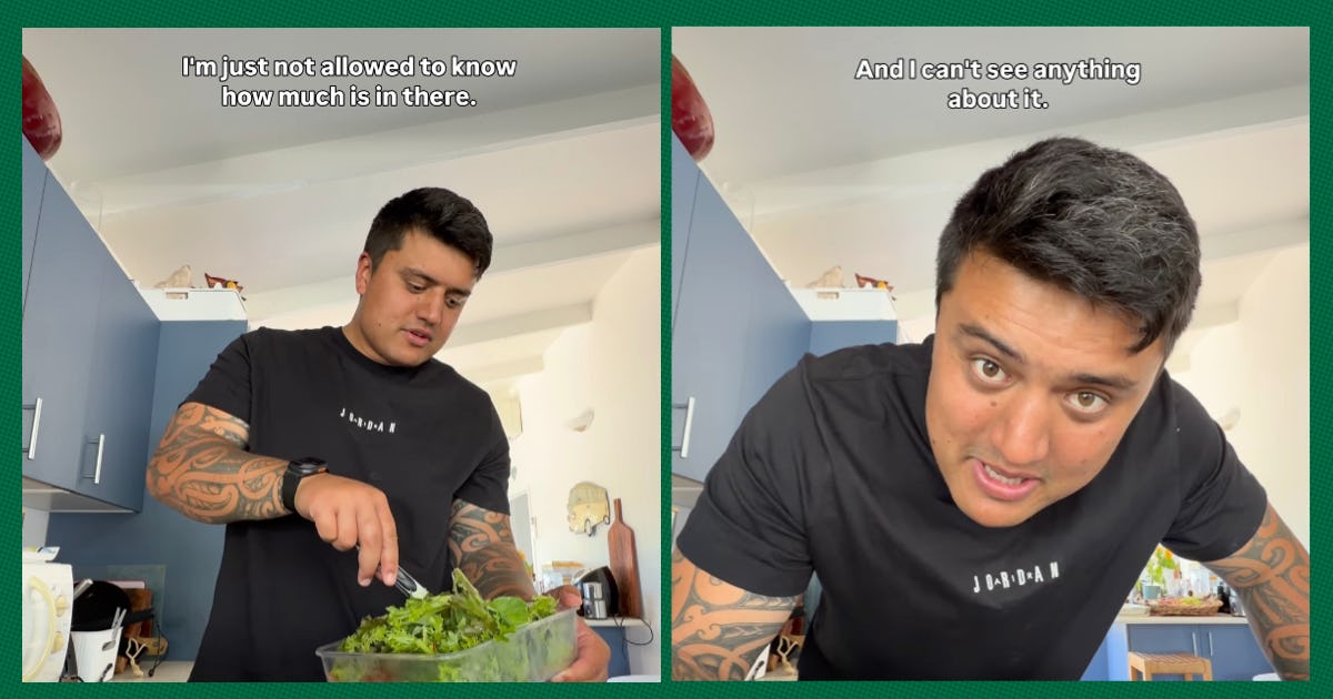 A man prepares a salad while talking into the camera. 