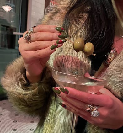 Olive nail art brings dirty martini vibes to your fingertips.