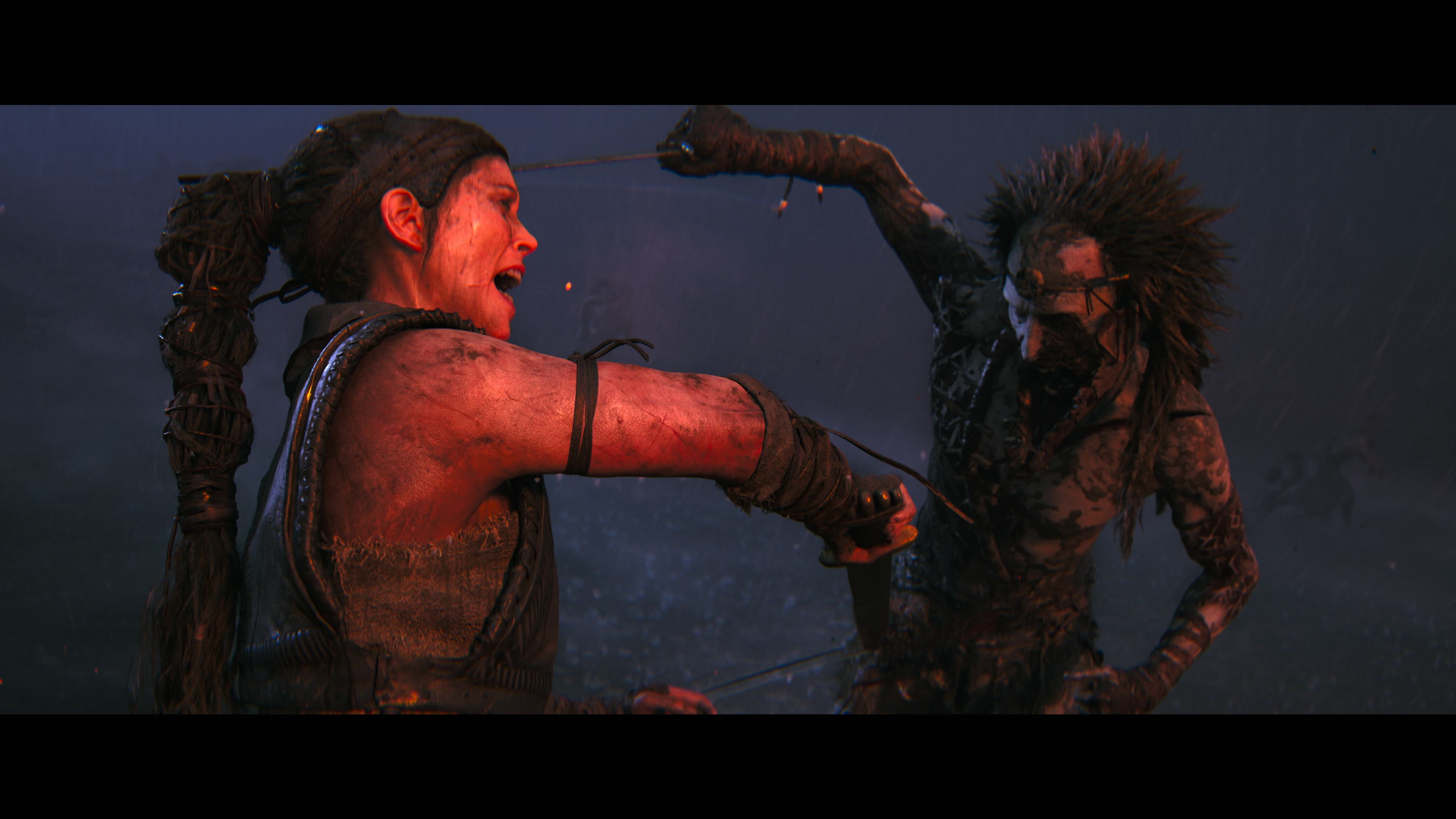 Senua engages in intense combat with a monstrous figure in a dark, misty environment.