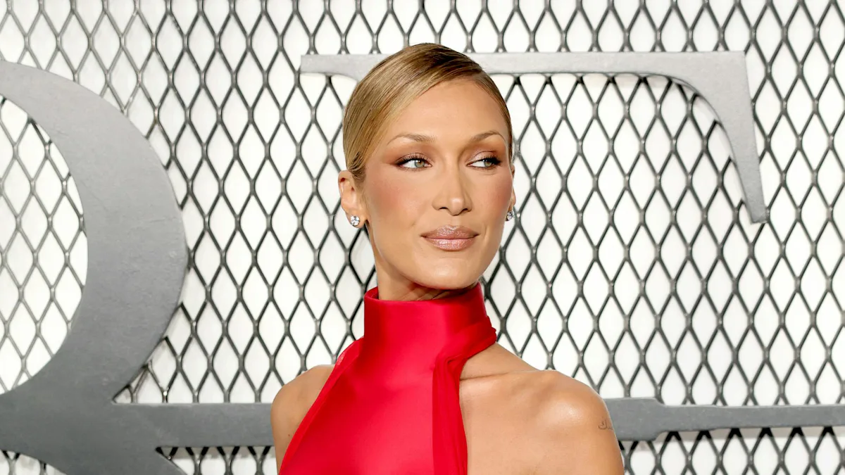 bella hadid red leather dress Model Bella Hadid stuns in skin-tight red leathers on motorbike as she shoots new comic-inspired TV show