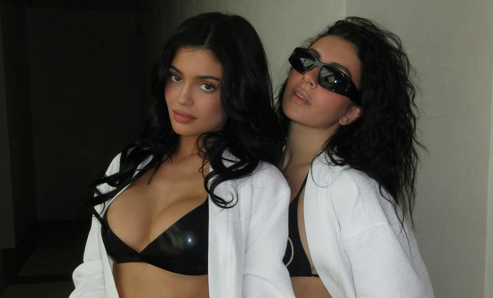 Charli XCX & Kylie Jenner Wore The Tiniest, Matching Bikinis To Promote Their Movie