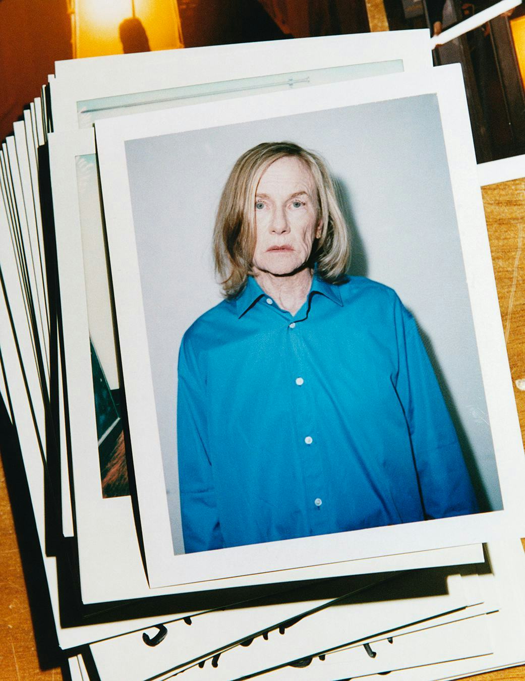 Amy Madigan in a blue shirt