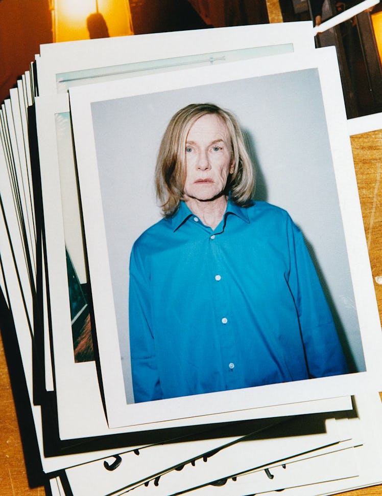 Amy Madigan in a blue shirt