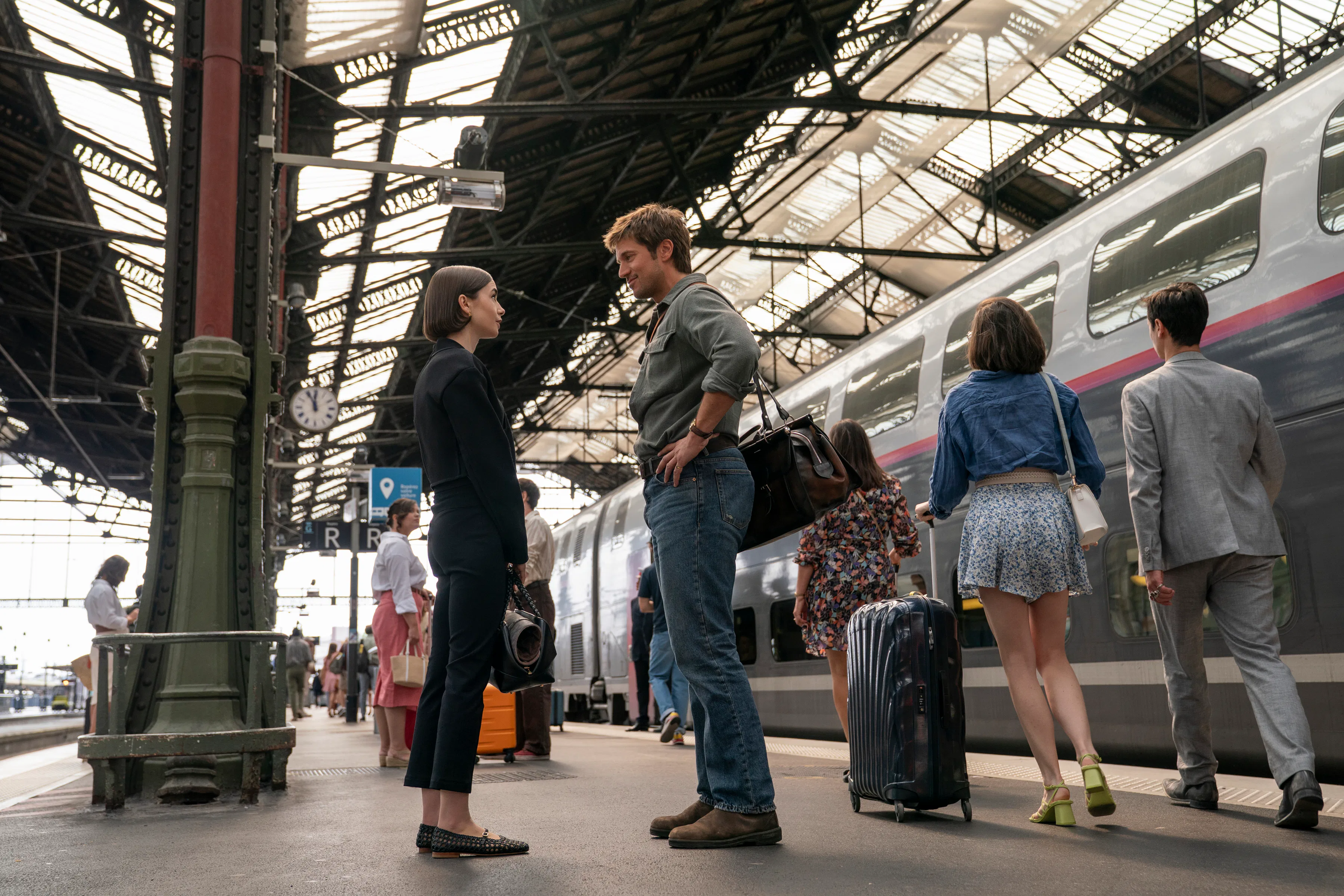 Emily and Gabriel in Emily in Paris. Photo via Netflix