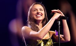 Olivia Rodrigo wore a persimmon minidress in her new Lancome ad.