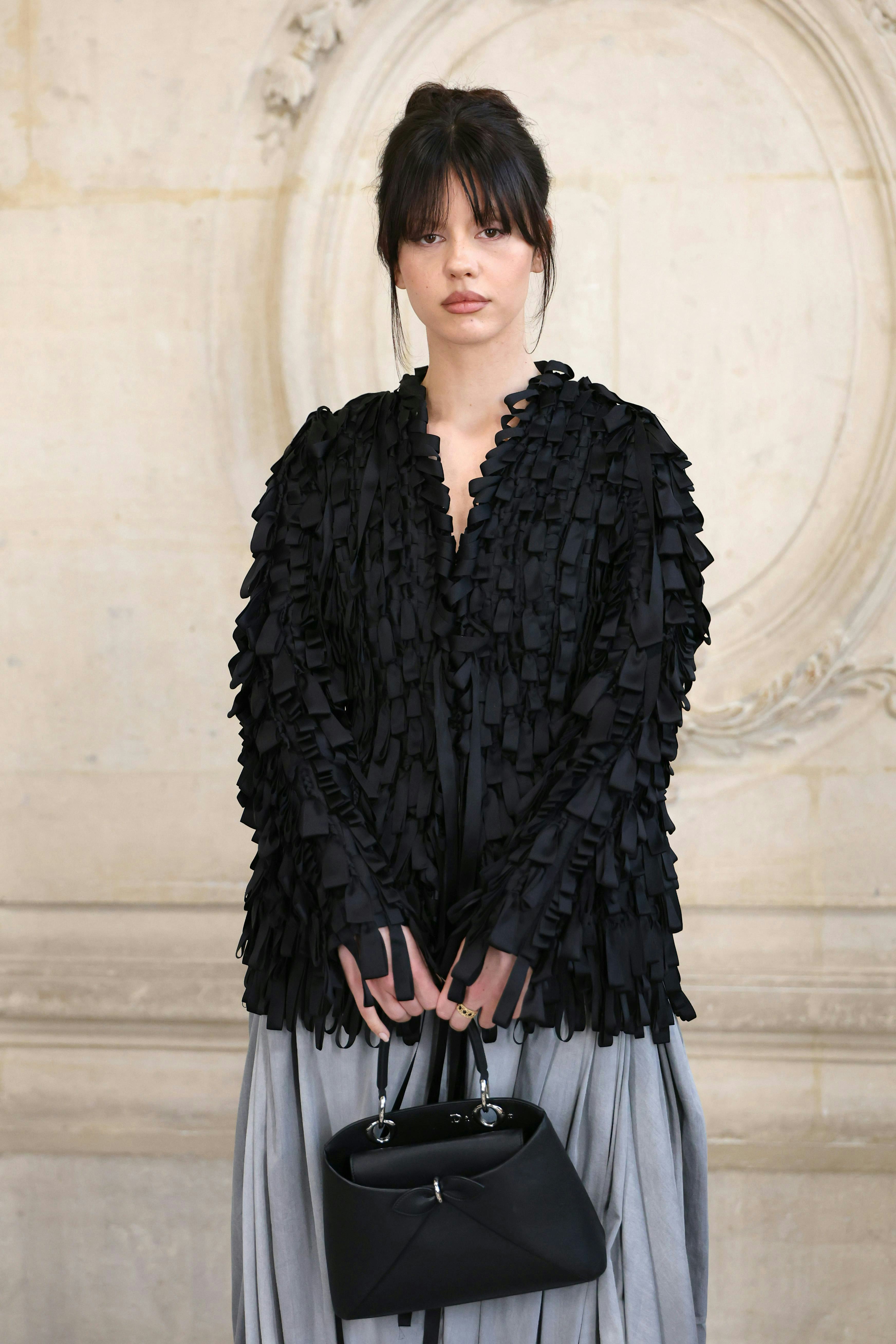 Mia Goth Brings the Pickpocket Bag to Paris Fashion Week