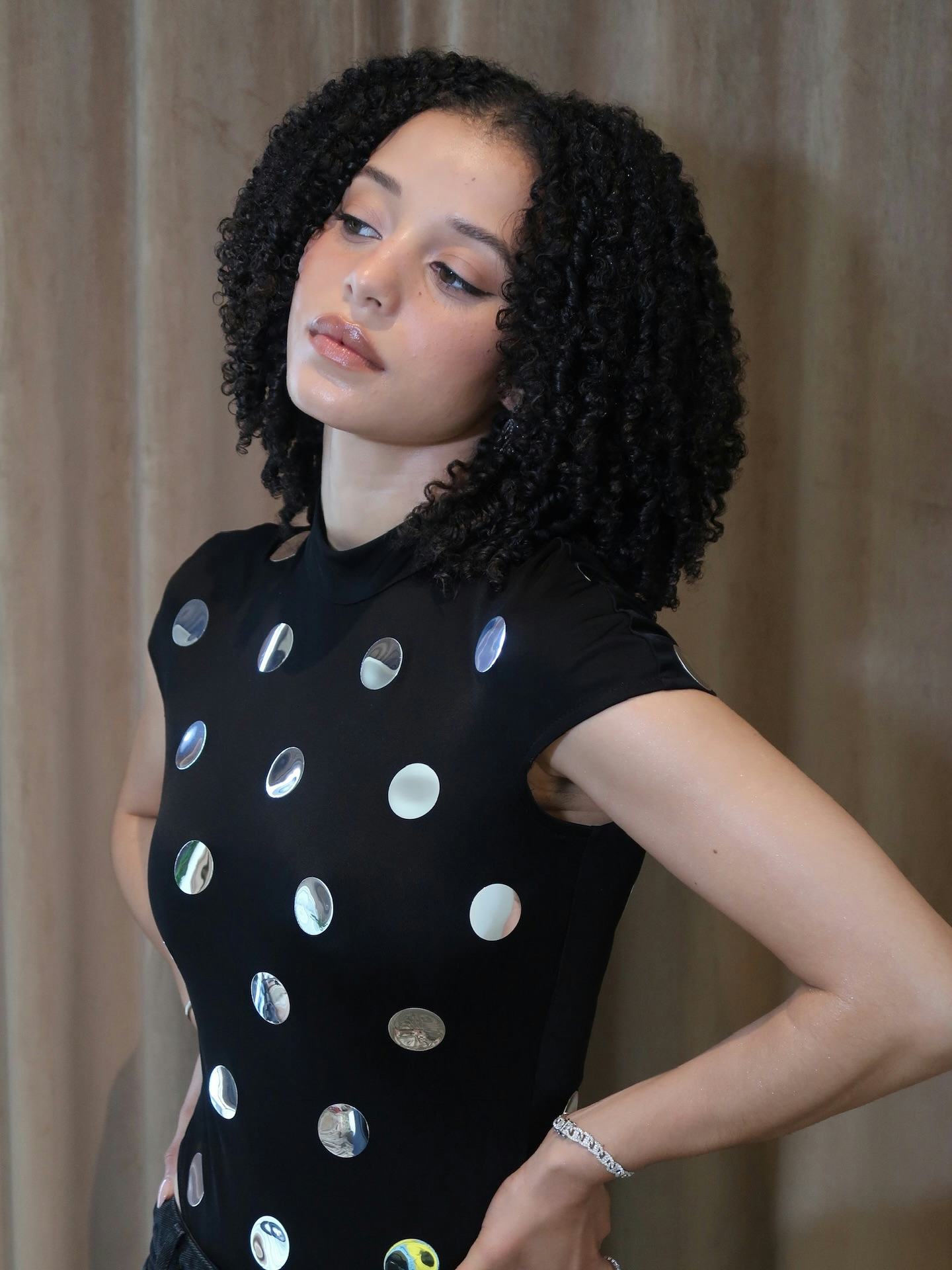 Chase Infiniti with a defined wash and go hairstyle