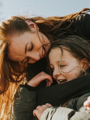 mother holds child