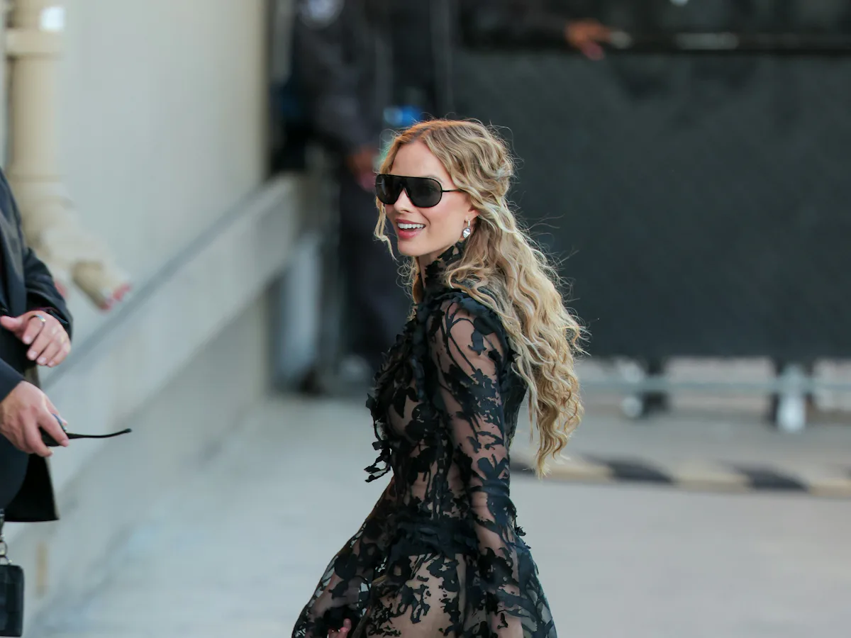 margot robbie lace dress Margot Robbie turns heads in sheer Alexandar McQueen lace for 'Wuthering Heights' promo