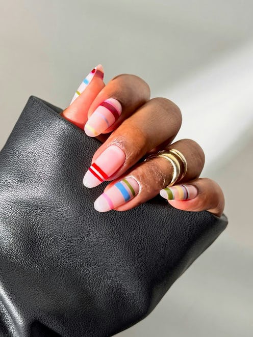 20 striped nail ideas that are fun, vibrant, and colorful.