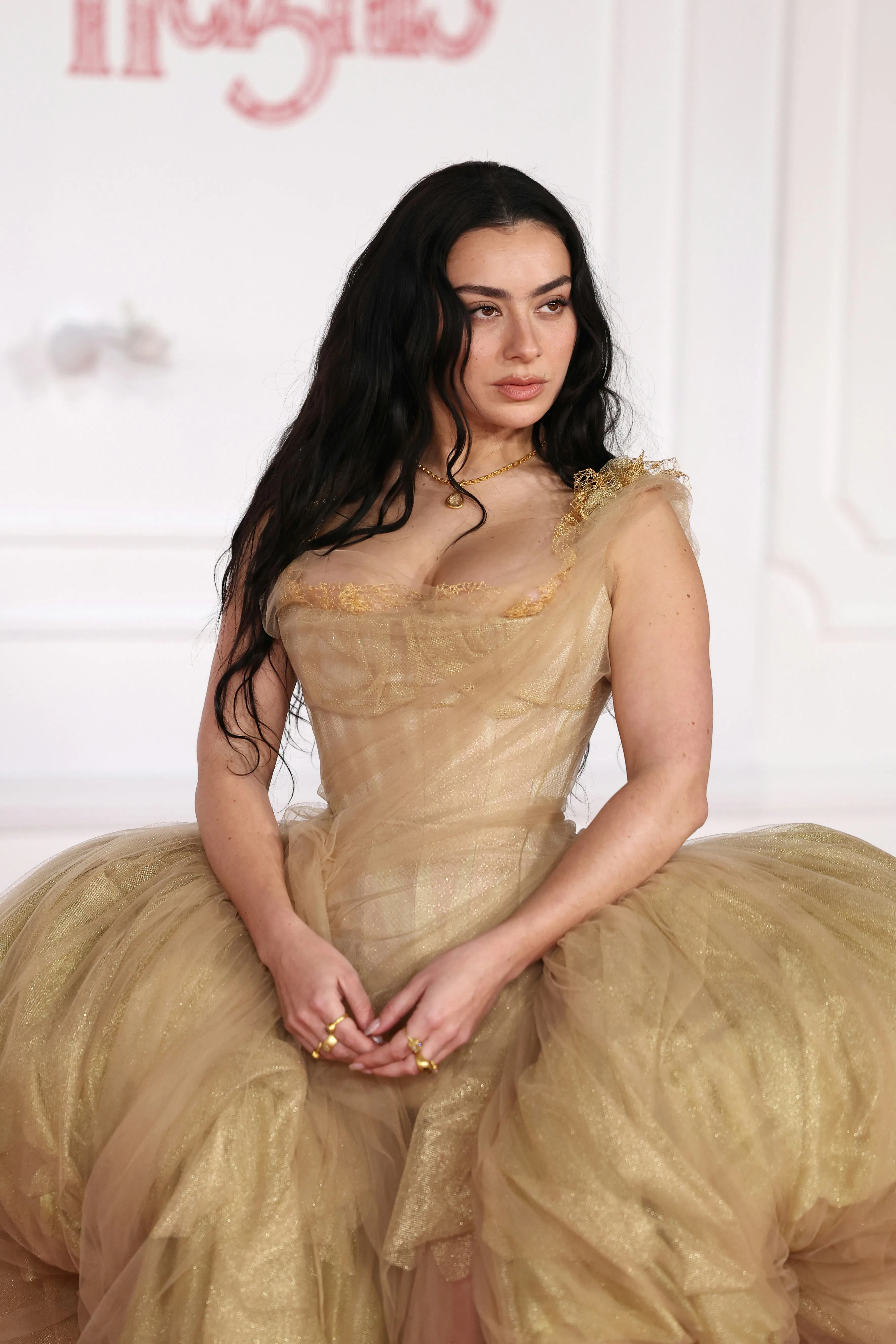Charli xcx Brings Sheer Power Hips to 'Wuthering Heights' Premiere