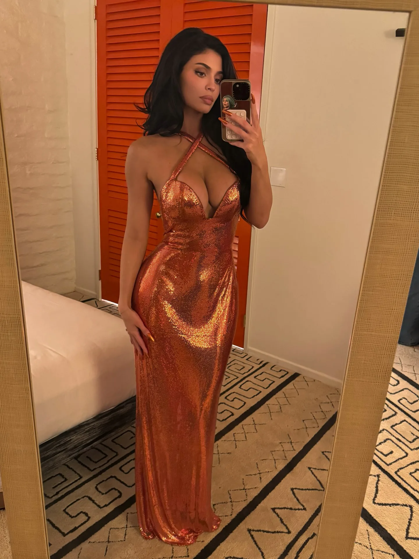 kylie jenner orange dress Kylie Jenner's Orange Leather Bottega Veneta Dress