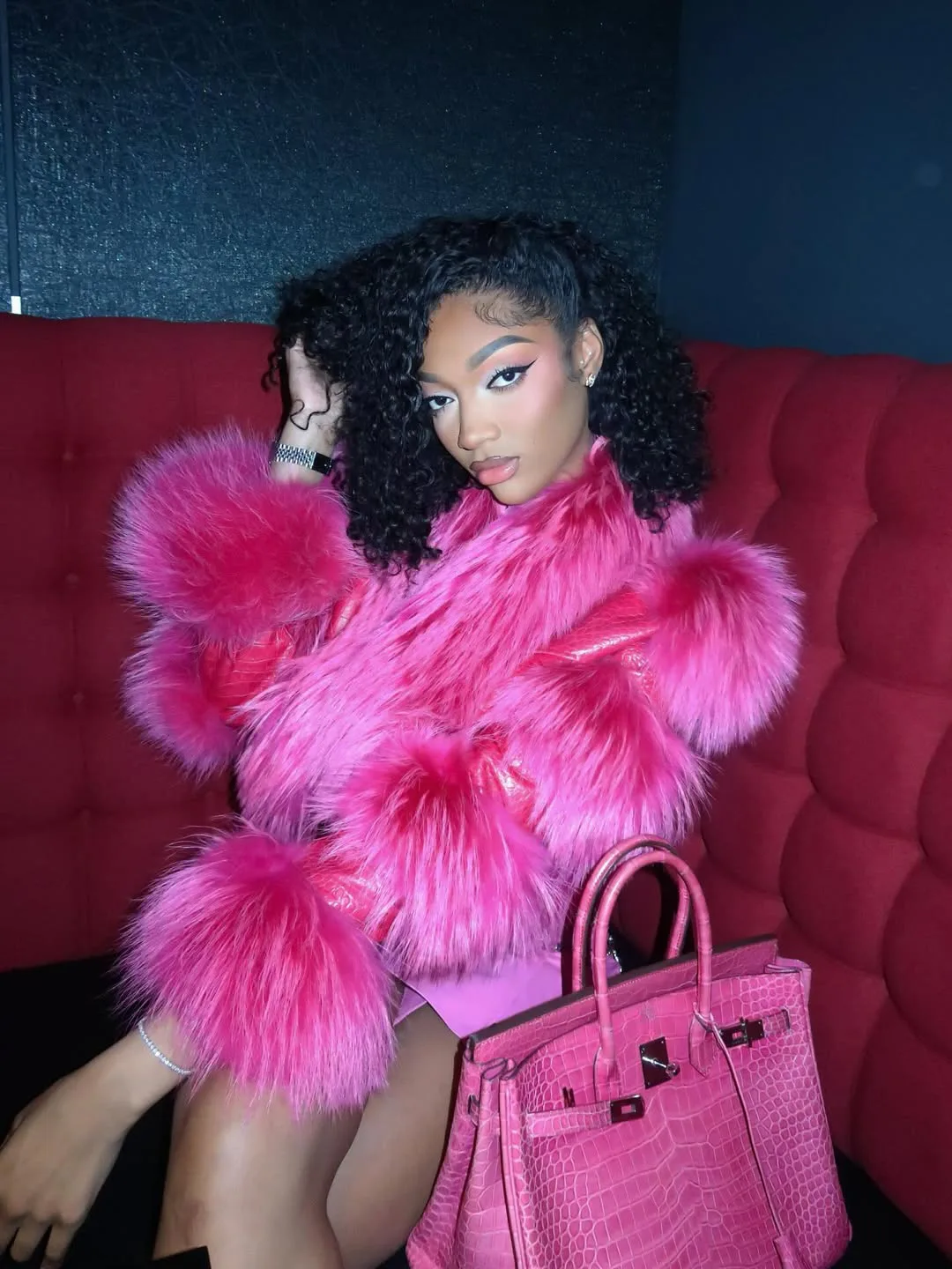 Angel Reese paired a $46k Birkin with her Y2K-coded "Barbiecore"  'fit.