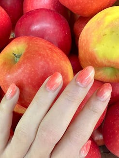 K-beauty nail trends taking over in 2026, from fruit peel manis to omakase designs.