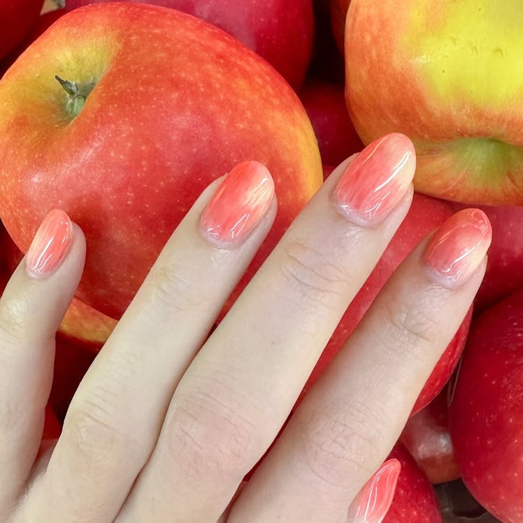 K-beauty nail trends taking over in 2026, from fruit peel manis to omakase designs.